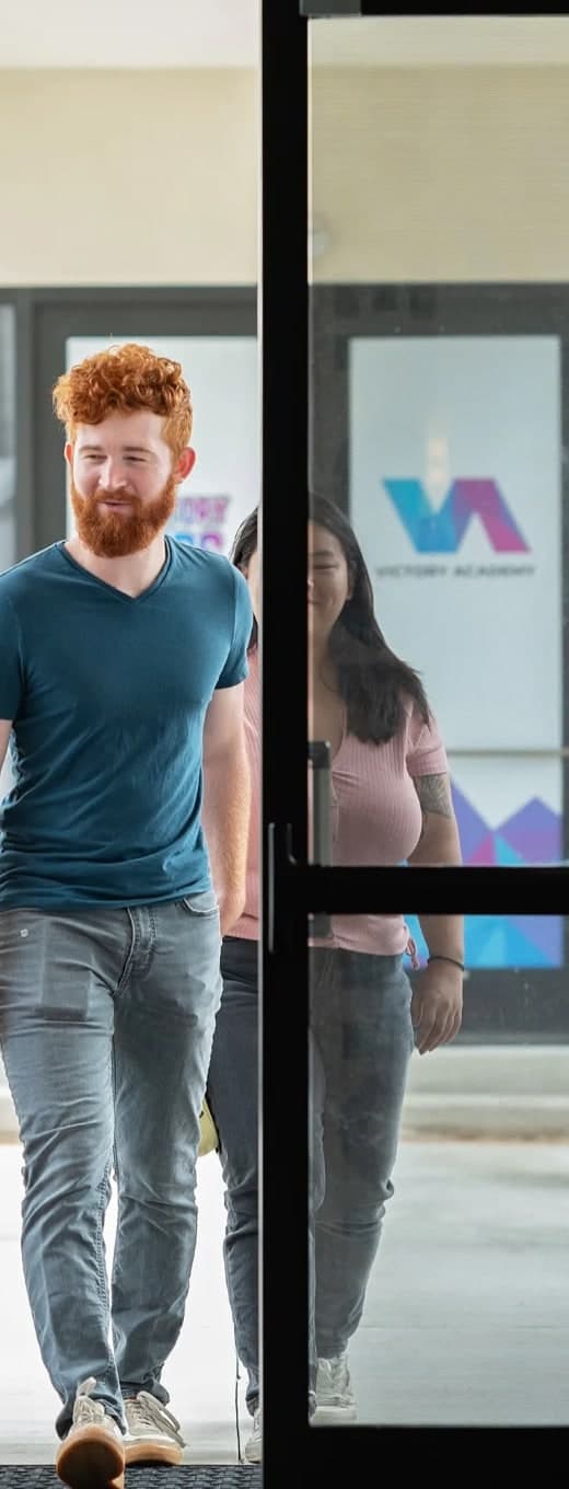 A guest walking through Victory Church’s front doors, from the photography on its website.